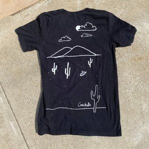 Black Coachella tshirt with cactus graphic and desert landscape